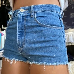 The cutest and comfiest high waisted denim shorts w rhinestone detailing